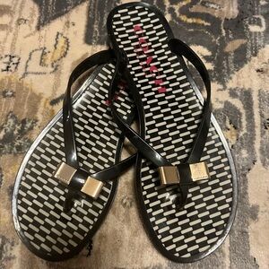Black Coach Flip Flops with Gold Bow Size 8